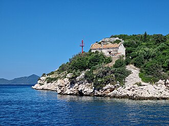 Photo of Port of Slano lighthouse on cape Donji